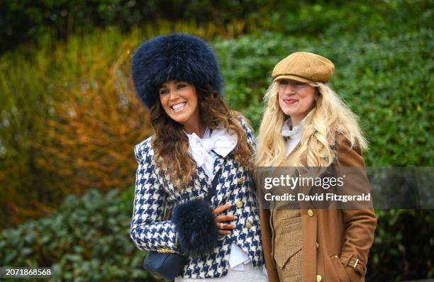 Gloucestershire , United Kingdom - 12 March 2024; Racegoers Rebecca Lyons, left, and Abby Whithall prior to racing on day one of the Cheltenham...