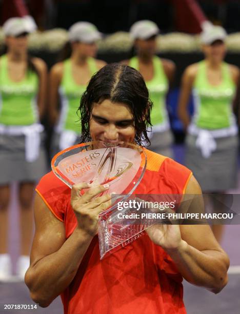 Spain's Rafael Nadal holds the trophy after beating Croatia's Ivan Ljubcic to win the Men's singles final of the Madrid masters tennis tournament in...