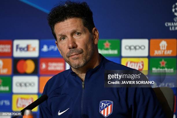 Atletico Madrid's Argentinian coach Diego Simeone gives a press conference on the eve of their UEFA Champions League last 16 second leg football...