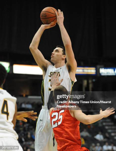 Siena's Brett Bisping goes up for a jump shot during a basketball game against Fairfield at the Times Union Center Monday, Feb. 10, 2014 in Albany,...