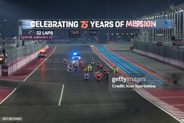 General view of the warm up lap before the start of the MotoGP race of the Qatar Airways Grand Prix of Qatar held at Lusail International Circuit in...