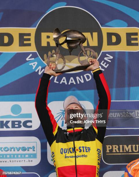 Belgian Belgian Stijn Devolder of Quick Step celebrates on the podium after winning the 92st Tour of Flanders cycling race held over 264km from...