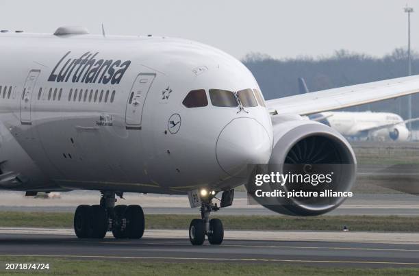 March 2024, Hesse, Frankfurt/Main: A Lufthansa passenger plane taxis for take-off at Frankfurt Airport. Due to the ongoing strike by Lufthansa cabin...
