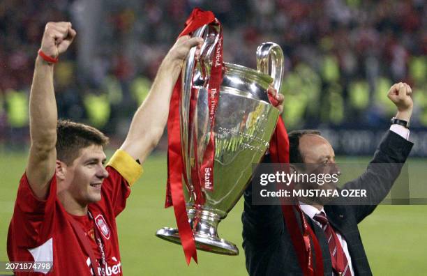 Liverpool's captain Steven Gerrard holds the throphy with Liverpool's Spanish Manager Rafael Benitez at the end of the UEFA Champions league football...