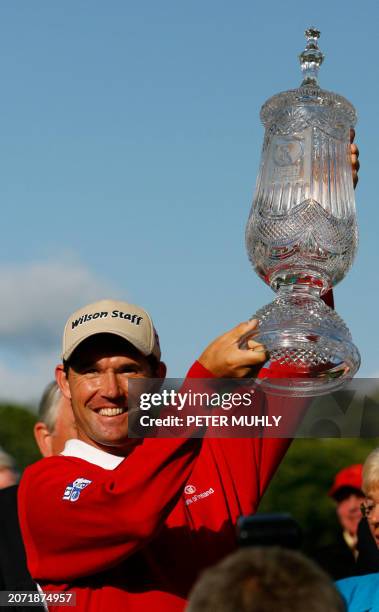 Padraig Harrington of Ireland holds up the winner's trophy 20 May 2007 during the final round of the Irish Open at the Adare Manor Hotel and Golf...