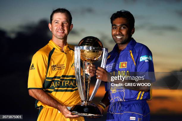 Australian cricket team captain Ricky Ponting and his Sri Lankan counterpart Mahela Jayawardene pose with the ICC Cricket World Cup trophy at the...