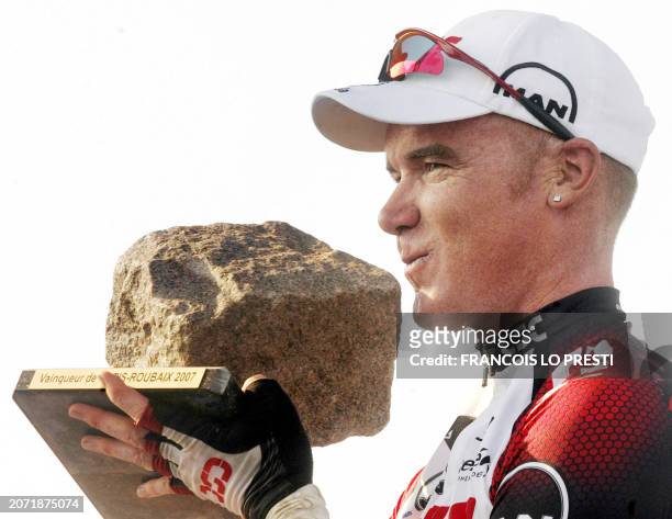Australian Stuart O'Grady poses with his trophy after winning the 105th edition of the Paris-Roubaix cycling race, 15 April 2007 at the Roubaix'...