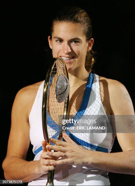 French Amelie Mauresmo celebrates as she won the final against Kim Clijsters at the Antwerp Proximus Diamond Games WTA tennis tournament, 18 February...