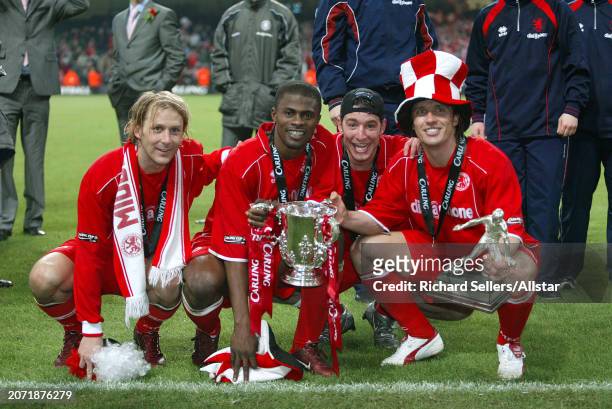 February 29: Gaizka Mendieta, George Boateng, Franck Quedrue and Bolo Zenden of Middlesbrough celebrates with trophy after winning the Carling Cup...