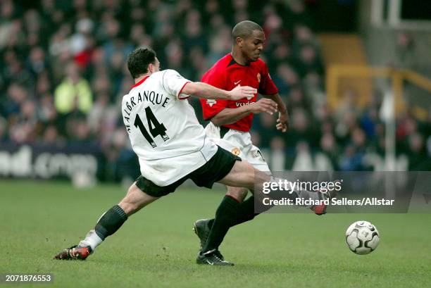 February 28: Steed Malbranque of Fulham and Quinton Fortune of Manchester United challenge during the Premier League match between Fulham and...