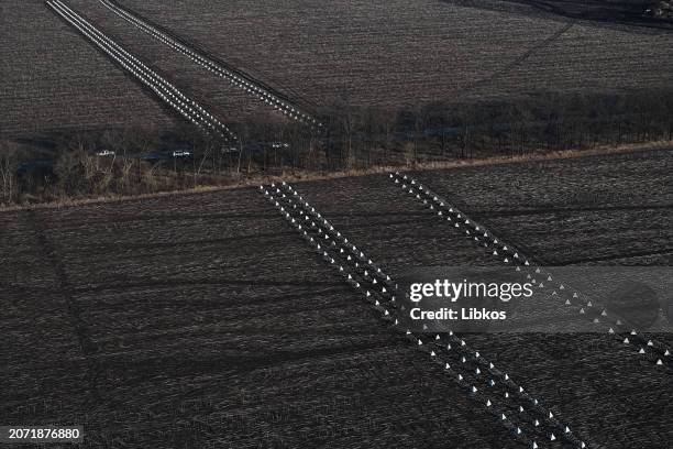 Drone view of "Dragon's teeth", anti-tank obstacles, seen on the new defense line on March 12, 2024 in Kharkiv region, Ukraine. Ukraine has...