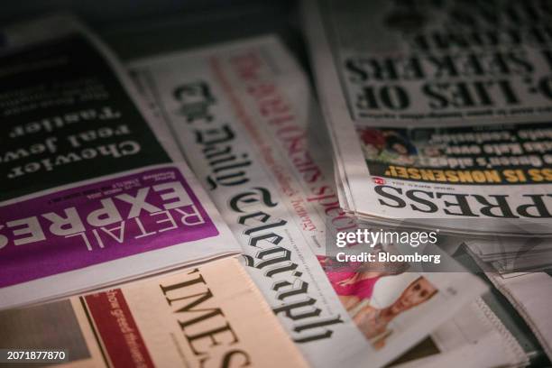 Copies of The Daily Telegraph newspaper and other national newspaper titles for sale on a newsstand in London, UK, on Tuesday, March 12, 2024. Rupert...