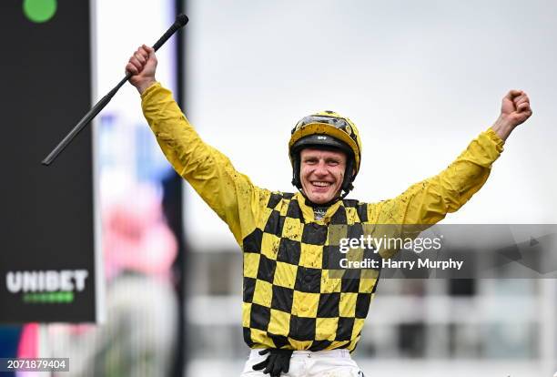 Gloucestershire , United Kingdom - 12 March 2024; Jockey Paul Townend celebrates aboard State Man after winning the Unibet Champion Hurdle Challenge...