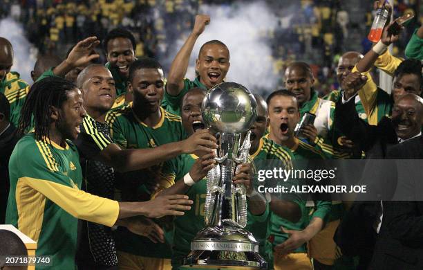 Bafana Bafana´s players celebrate their victory over Cameroon during the annual Nelson Mandela Challenge soccer game at Olympia Park in Rustenburg on...