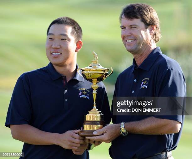 Golfers Paul Azinger and Anthony Kim of the USA team pose during a group photo session for the Ryder Cup September 17, 2008 at Valhalla in...