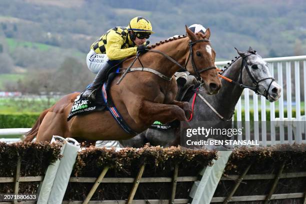 Jockey Paul Townend and State Man take the final hurdle ahead of jockey Jack Kennedy on Irish Point on the way to victory in the Champion Hurdle on...