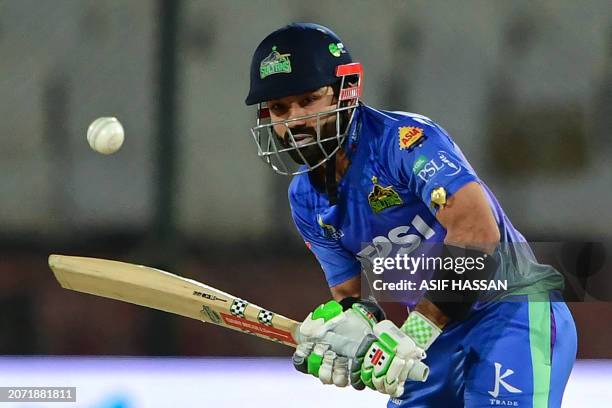 Multan Sultans' Mohammad Rizwan plays a shot during the Pakistan Super League Twenty20 cricket match between Multan Sultans and Quetta Gladiators at...