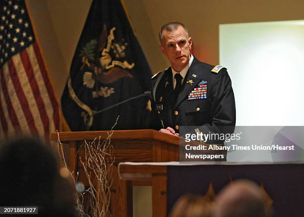 Lieutenant Colonel Sean Flynn speaks during a Catholic Mass and tribute ceremony held to remember Army Sgt. David Fisher on the 10th anniversary of...