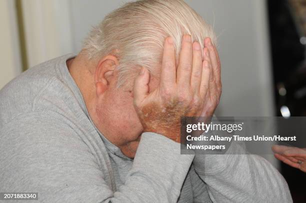 Vietnam veteran Peter Sajta breaks down and cries as he talks about the illnesses and injuries he and his family has at his home on Thursday, Jan....