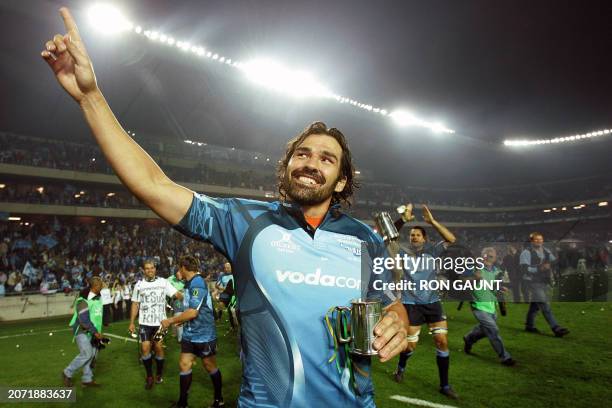 Bulls Captain Victor Matfield celebrates after winning the final on May 29, 2010 at the end of the Super14 Final match between Bulls and Stormers at...