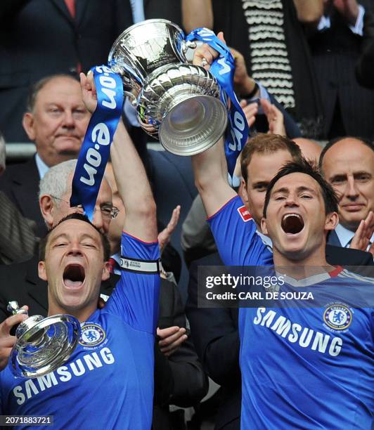 Chelsea captain John Terry and team-mate Frank Lampard lift the FA Cup as they celebrate beating Portsmouth 1-0 during the FA Cup Final football...