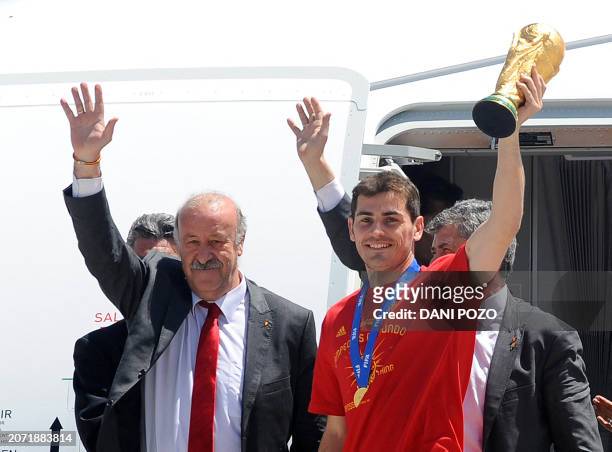 Spain's coach Vicente del Bosque and Spain's goalkeeper and captain Iker Casillas arrive at Barajas' airport on July 12, 2010 in Madrid, a day after...