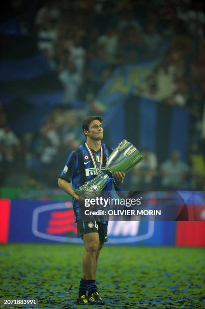 Inter Milan's captain Javier Zanetti celebrates their victory after their football match at the San Siro Stadium in Milan on August 21, 2010 . Inter...