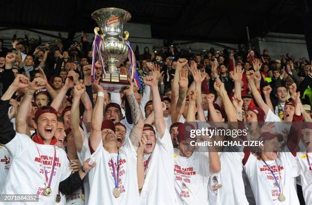 Sparta Prague's football squad celebrate their first place in the Czech Republic football league on May 15, 2010 after defeating the FK Teplice 1:0...