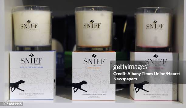 Aromatherapy soy candles for dogs are on display at Mini Me Pups Boutique on Friday, Feb. 6, 2015 in Saratoga Springs, N.Y.