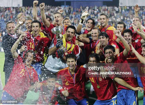 The Spanish team celebrate after winning the gold medal of the UEFA Under 19 Championships after the match against Scotland 2:1 in Poznan 29 July...