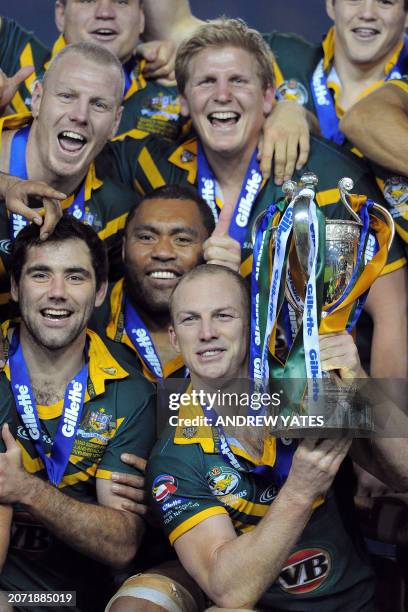 Darren Lockyer of Australia holds aloft the Gillette four nations trophy after his team had beaten England during the Rugby League four nations final...