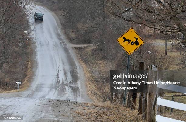 An Amish horse and buggy sign is seen on the side of the road on Wednesday, April 8, 2015 in St. Johnsville, N.Y. A local farmer, Robert Madsen, was...