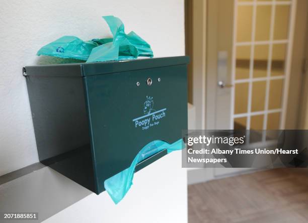 Box of doggie poo bags is seen inside the door to the courtyard at The Alexander at Patroon Creek on Friday, April 10, 2015 in Albany, N.Y.