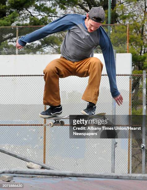 Garrett Rowland of Albany flies through the air on his skateboard in Washington Park on Thursday, April 23, 2015 in Albany, N.Y.