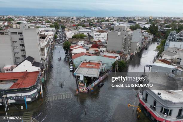 Aerial view of flooded streets in Avellaneda, Buenos Aires Province, Argentina, on March 12 following heavy rains in the area. A man died on Tuesday...