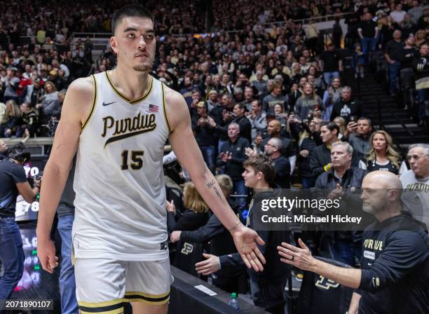 Zach Edey of the Purdue Boilermakers greets fans following the game against the Wisconsin Badgers at Mackey Arena on March 10, 2024 in West...