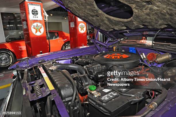 Engine of a purple Dodge Challenger R/T is seen in the showroom at Exit 5 Auto Group at 625 Watervliet-Shaker Road on Wednesday, Jan. 20, 2016 in...