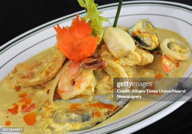 Stir fry mixed seafood with curry powder at Celadon Thai on Tuesday, March 1, 2016 in Latham, N.Y. Prawns, crab stick, scallops, mussels, fish...