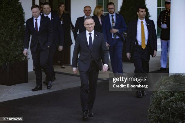 Andrzej Duda, Poland's president, center, arrives to speak to members of the media outside the White House in Washington, DC, US, on Tuesday, March...