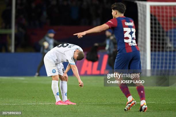 Napoli's Slovak midfielder Stanislav Lobotka reacts at the end of the UEFA Champions League last 16 second leg football match between FC Barcelona...