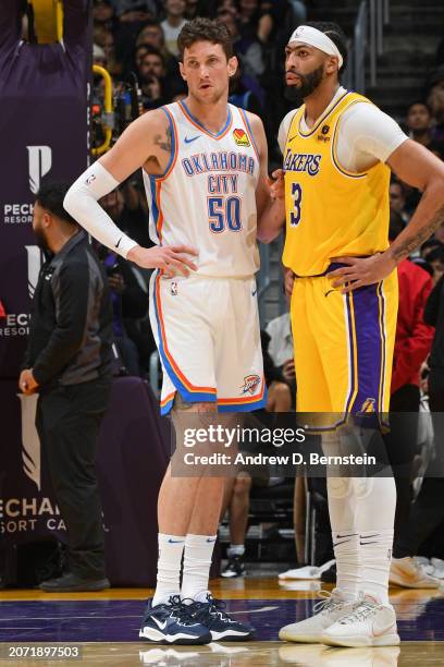 Mike Muscala of the Oklahoma City Thunder and Anthony Davis of the Los Angeles Lakers look on during the game on March 4, 2024 at Crypto.Com Arena in...