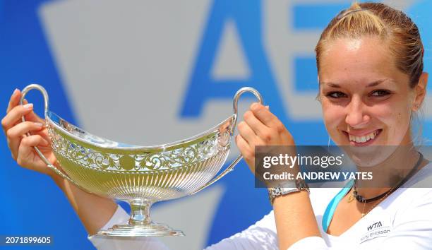 Germany's Sabine Lisicki holds the Maude Watson trophy after beating Slovakia's Daniela Hantuchova 6-3 6-2 during the final of the WTA AEGON Classic...