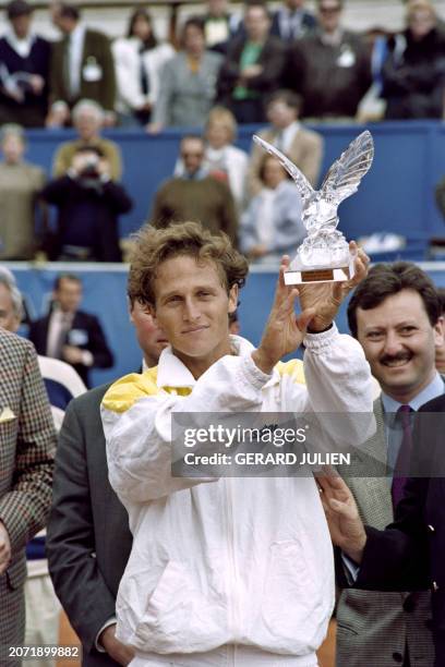 Martin Jaite from Argentina displays his trophy on April 21 after winning the Nice International Open. The ATP Nice Open is an ATP World Tour 250...