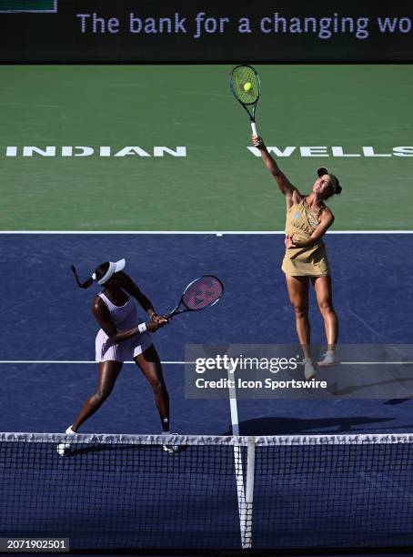 Ena Shibahara returns a ball over her partner Asia Muhammad during a WTA quarterfinals doubles tennis match played on March 12, 2024 during the BNP...
