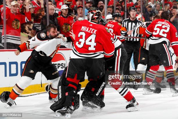 Radko Gudas of the Anaheim Ducks goes after Petr Mrazek of the Chicago Blackhawks after the whistle during the third period at the United Center on...