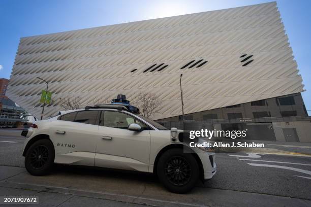 Los Angeles, CA A Waymo robotaxi Jaguar I-PACEs driverless car parks next to The Broad in downtown Los Angeles Monday, March 11, 2024. Waymo is about...