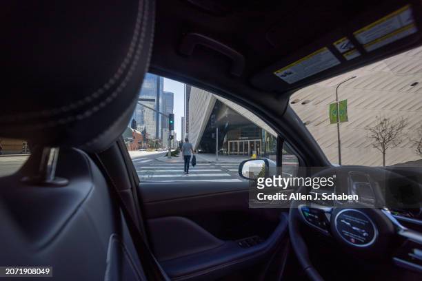 Los Angeles, CA A Waymo robotaxi Jaguar I-PACEs driverless car drives past The Broad in downtown Los Angeles Monday, March 11, 2024. Waymo is about...