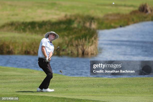 Joe Highsmith of the United States chips to the second green during the third round of the Puerto Rico Open at Grand Reserve Golf Club on March 09,...