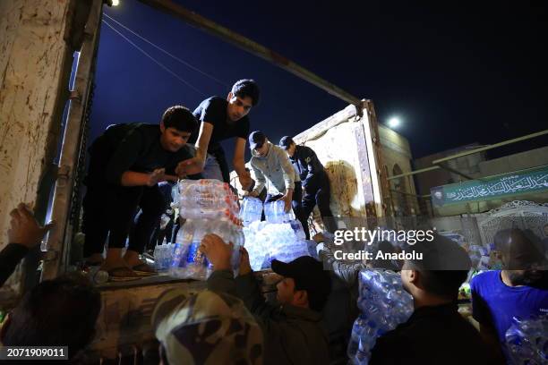 Group of volunteers collects humanitarian aid to be sent to Gaza due to the ongoing Israeli offensive and blockade on Palestinians, in Baghdad, Iraq...