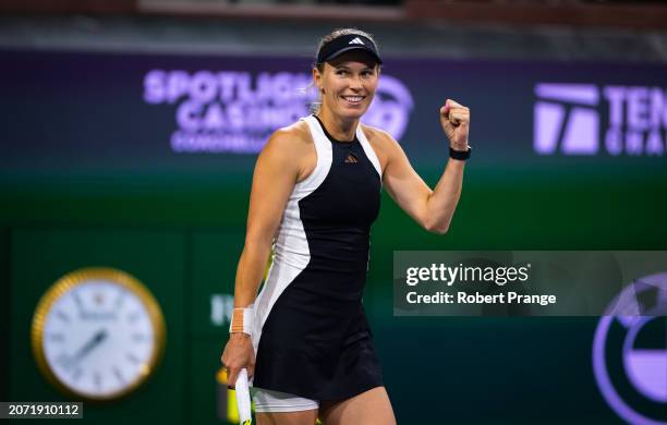 Caroline Wozniacki of Denmark in action against Angelique Kerber of Germany in the fourth round on Day 10 of the BNP Paribas Open at Indian Wells...